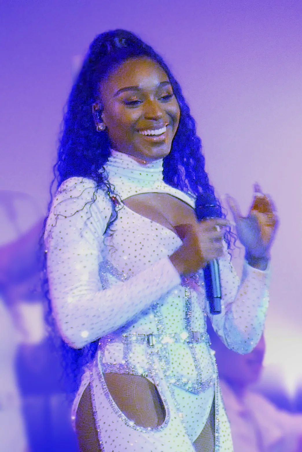 Singer Normani performing on stage.
